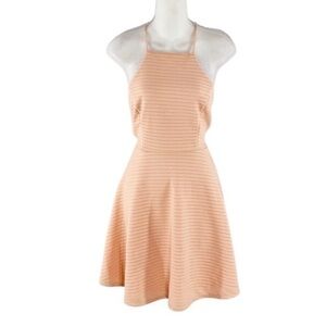 NWT Noble U peach perforated cross back flare dress